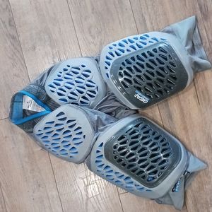 Mens small football pants pads.